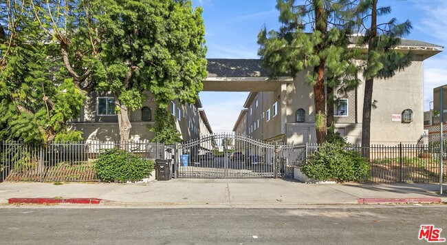Building Photo - 9034 Willis Ave Unit 14