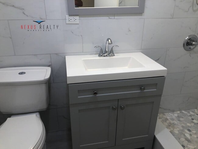 Photo - 225-01 59th Ave