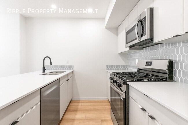 Photo - Modern 3 Beds, 2.5 Baths Main Floor/ Upper | Pets Allowed