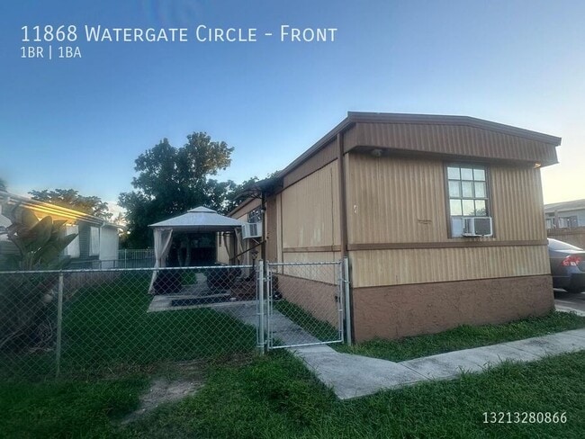 Building Photo - 11868 Watergate Cir Unit Front