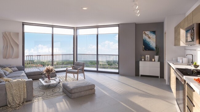 Salón-cocina luminoso y moderno de concepto abierto con ventanales panorámicos y una decoración elegante, que ofrece vistas impresionantes.