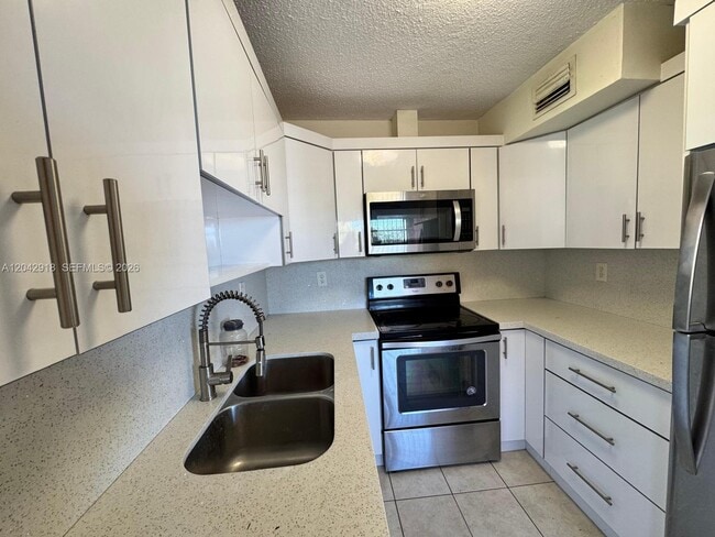 Building Photo - 6675 W 4th Ave Unit 310