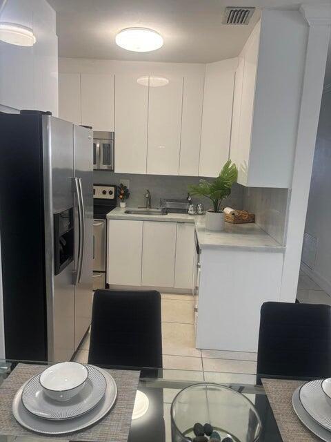 Photo - 299 SW 7th St Unidad 110