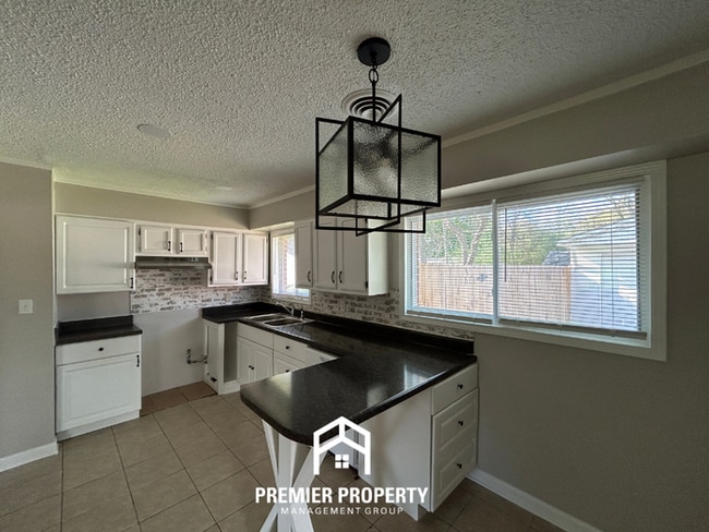 Photo - Charming 3BR Southaven Home | Brick Fireplace, 2-Car Garage & Fenced Yard