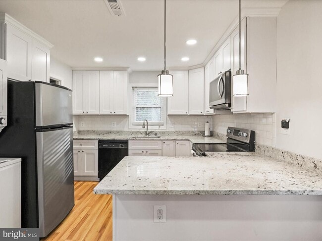 Photo - This home blends urban accessibility with peaceful natural surroundings.