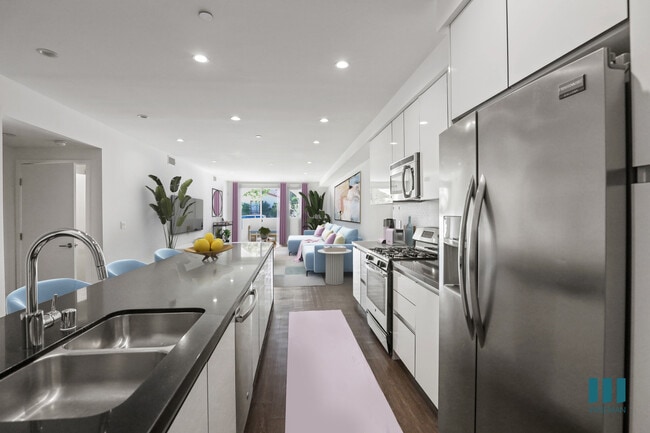 Open-Concept Kitchen and Living Room with Patio - Kelton Alexander by Wiseman