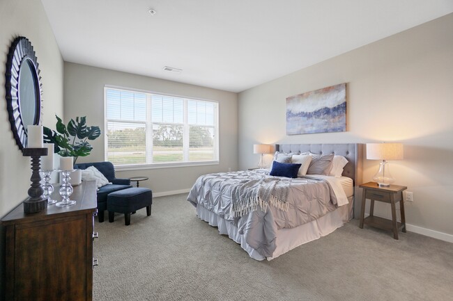 Seasons at River View Apartments in Pleasant Prairie, Wisconsin. Luxury, condo style, studio, 1 bedroom, 2 bedroom, and 3 bedroom apartments, with private garages and entries. - Seasons at River View