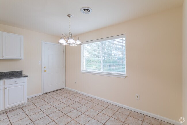 3 BR 2 BA - 1165 Sq Ft - Kitchen - Upland Village Apartments