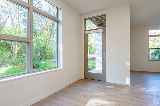 3BR, 2BA - 1,209SF - Living Room - The Flats at Bishop's Woods