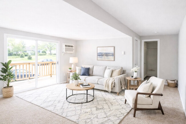 Living Room With Balcony - Staged - PARK MANOR