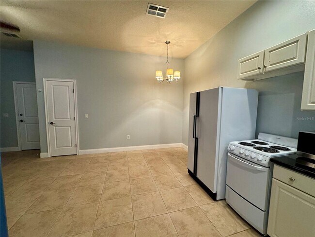 Photo - Cozy 1BR Apartment with Separate Entrance, All Utilities Included + Patio Retreat