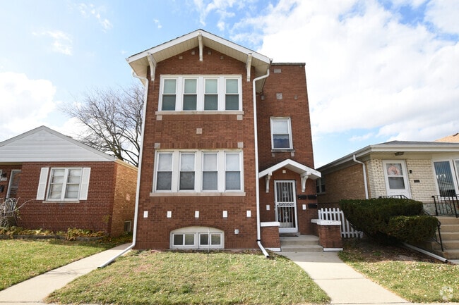 Building Photo - 5130 N Austin Ave Unit GARDEN Rental