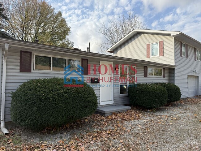 Building Photo - Two Bedroom | Attached Garage Unit A Rental