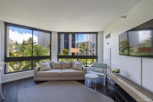 Photo - 1 bedroom, den with murphy bed, 1 cov parking, tropical grounds with pool, tennis courts +++++++