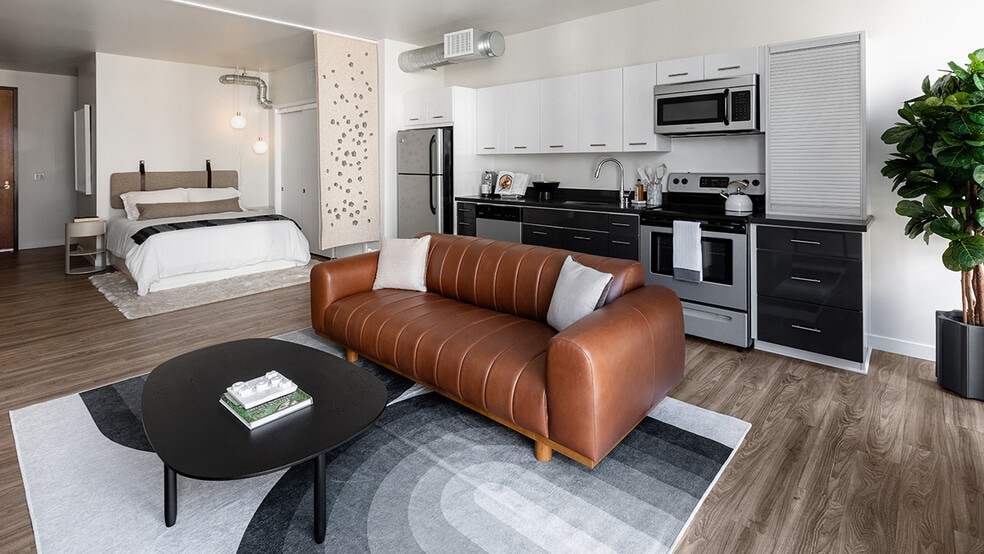 Griffis East Village Reno Model Living Room and Kitchen and Bedroom