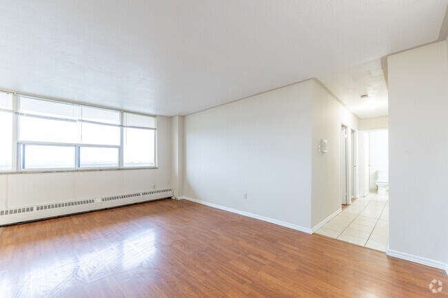 1BR + DEN, 1BA - 720SF - Living Room - 11 Kendale Court Apartments