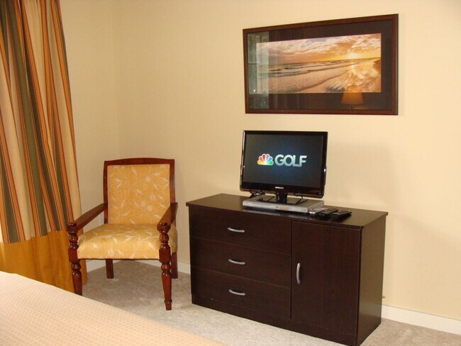 Photo - 1-bedroom furnished condo with fenced courtyard