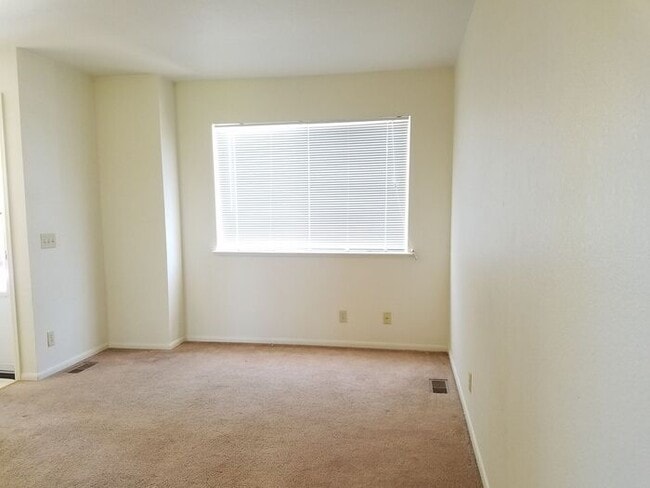 Photo - 2 Bed 1.5 Bath Townhouse End Unit in North Central Loveland - Water/Sewer/Trash Included in Rent!