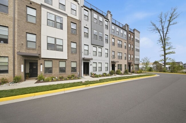 Photo - Perfectly positioned near the vibrant shopping and dining destination of One Loudoun, this reside...