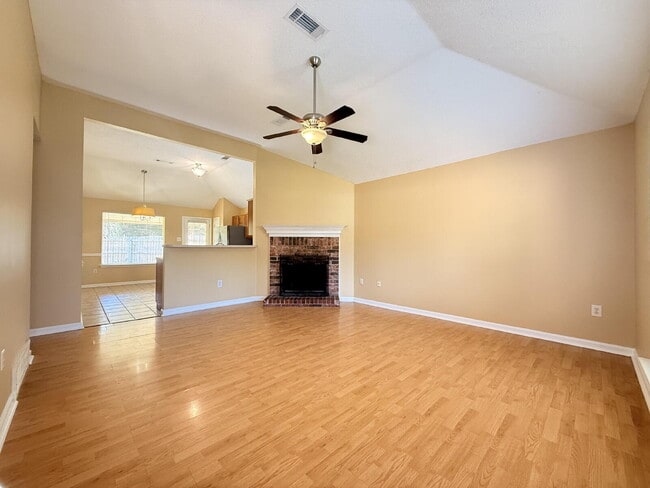 Photo - "Charming 3-Bedroom Lakeland Home with Cozy Fireplace & Gleaming Hardwood Floors!"