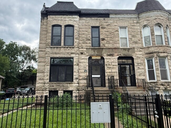 Building Photo - 7626 S Normal Ave Unit 1
