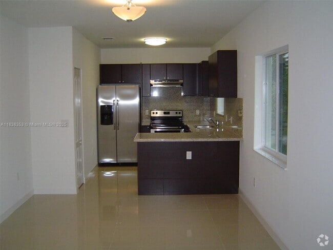 Building Photo - 1153 SW 13th St Unit 0 Rental