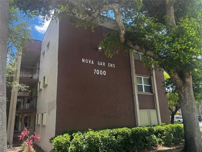 Building Photo - 7000 Nova Dr Unit 103E