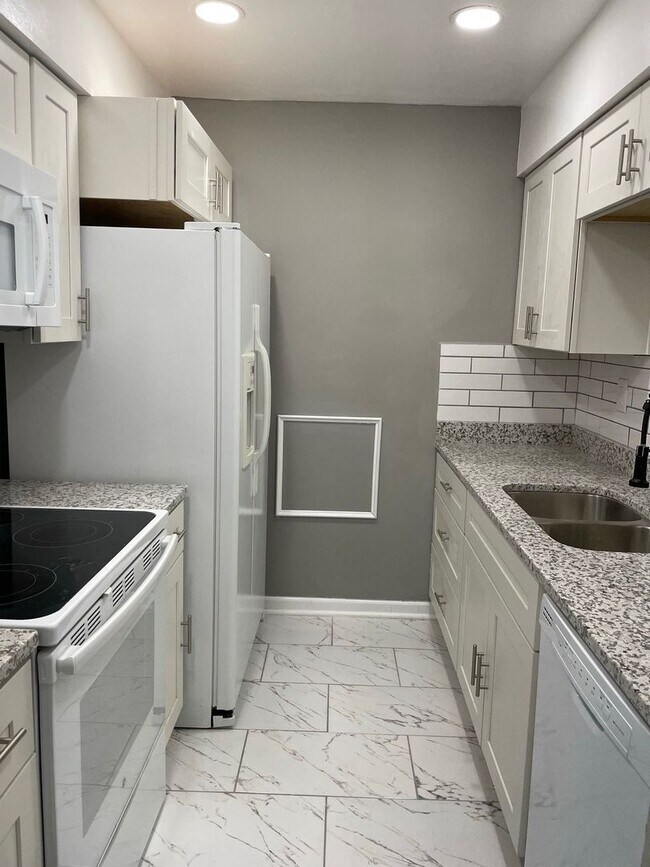 Photo - Welcome to our charming Townhome in the he...