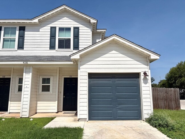 Building Photo - Corner Unit Townhome with 3 Bedrooms, Garage & Private Yard