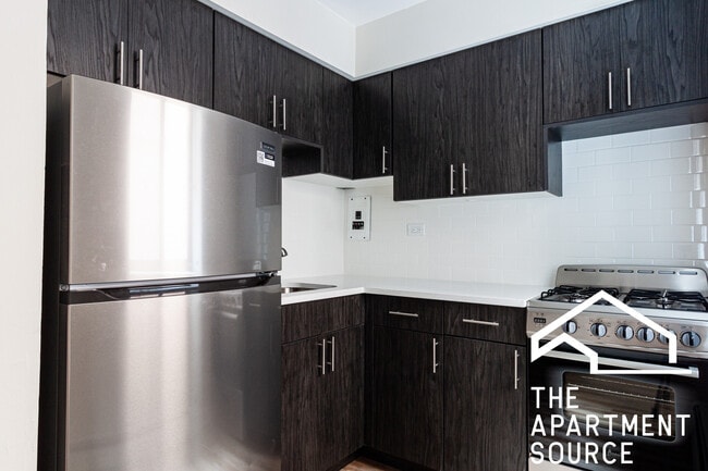 Building Photo - 5851 N Winthrop Ave Unit 304