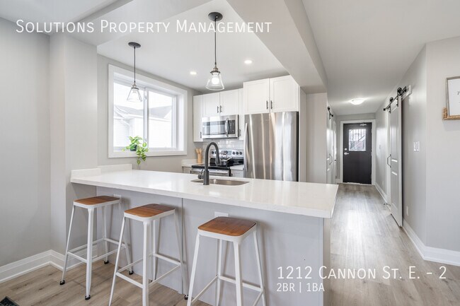 Photo - **2 bedroom Main Floor with Modern finishes AVAILABLE Now!** Unit 2