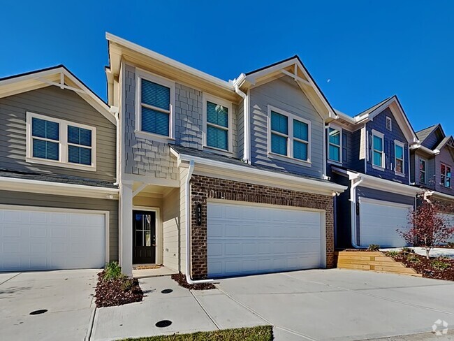 Building Photo - 4 Bedroom Townhome - Move-in special!