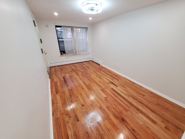 Building Photo - 130 W 132nd St Unit Garden Level Rental