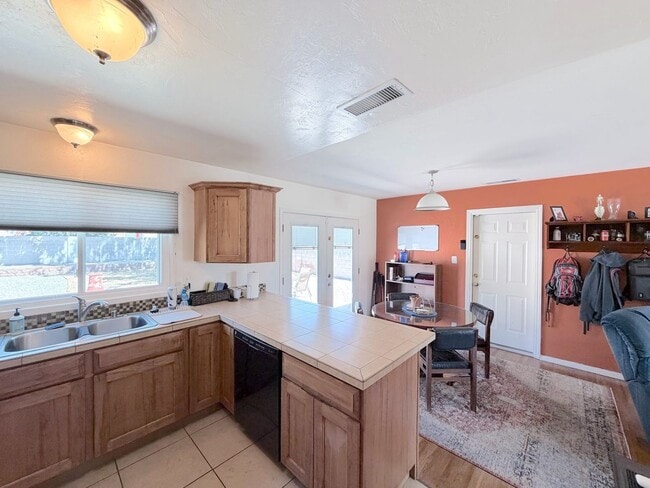 Photo - Charming 3 Bedroom, 2 Bathroom NE ABQ Home. Refrigerated Air! Spacious backyard. Near Uptown