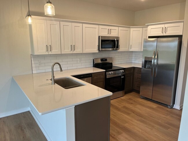 Photo - Spacious 5-Bedroom Duplex Near Asbury Elementary with Finished Basement & Full Amenities