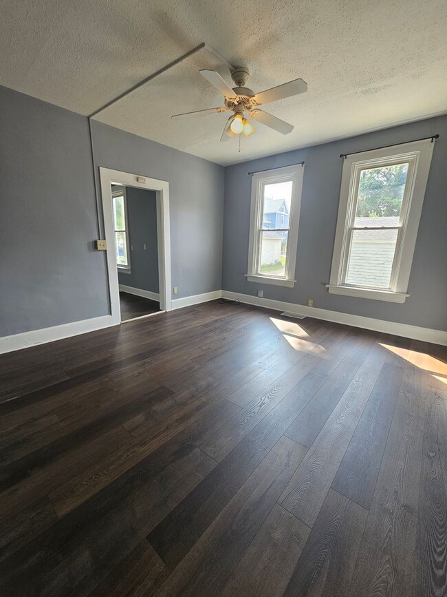 Photo - 1209/1211 W 15th St. NO MAINTENANCE WITHOUT APPROVAL call 563-505-0219 Unit 1211 W 15th St