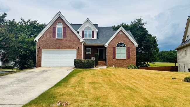 Building Photo - 5BR/3.5BA Home in a Swim/Tennis Community ...