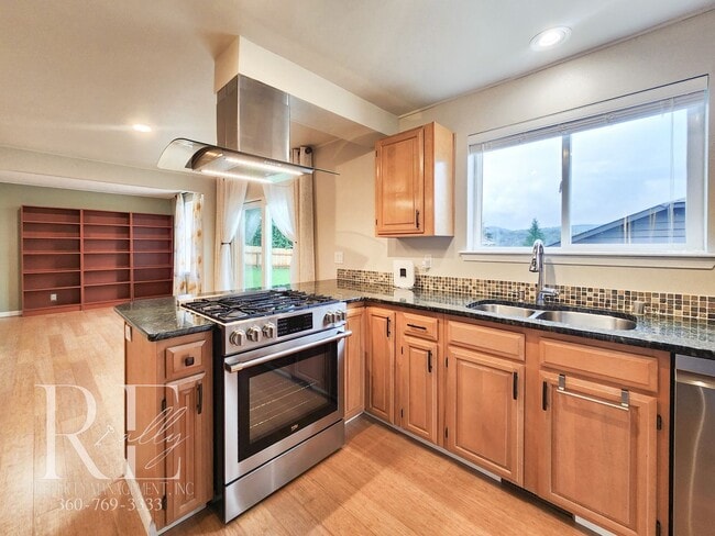 Photo - Modern Elegance Meets Tranquil Lakeside Living On Osprey Circle