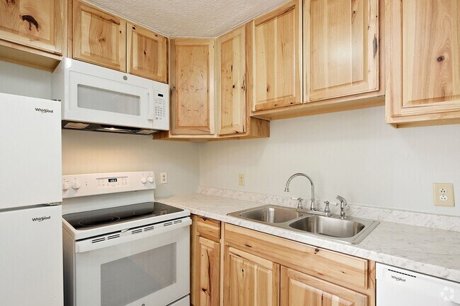 Building Photo - Newly Updated Brick Duplex In Woolen Mills... Rental
