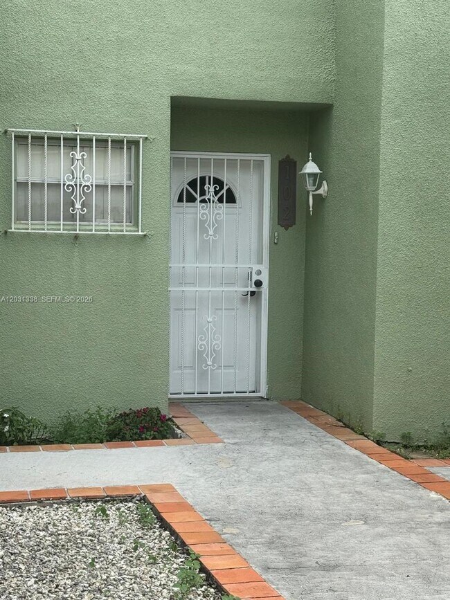 Building Photo - 11173 NW 7th St Unit 102-18