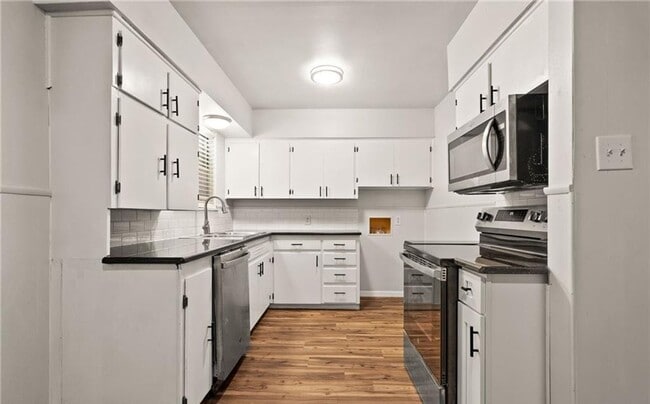 Photo - Renovated 4-bedroom 1.5 bathroom home!  Housing accepted! MOVE-IN SPECIAL!