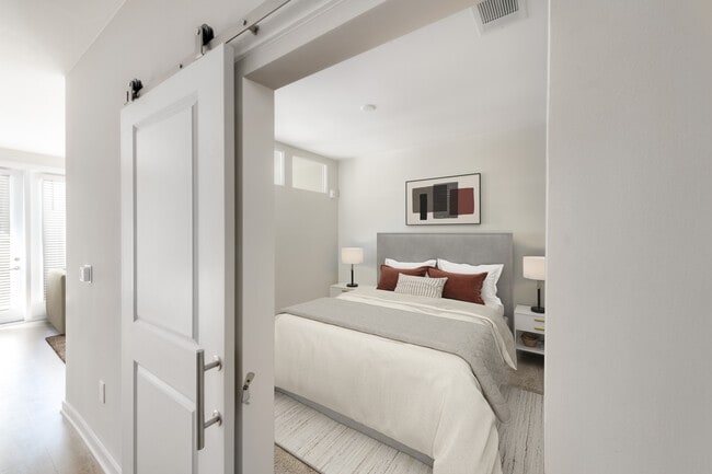 Studio bedroom with sliding barn door