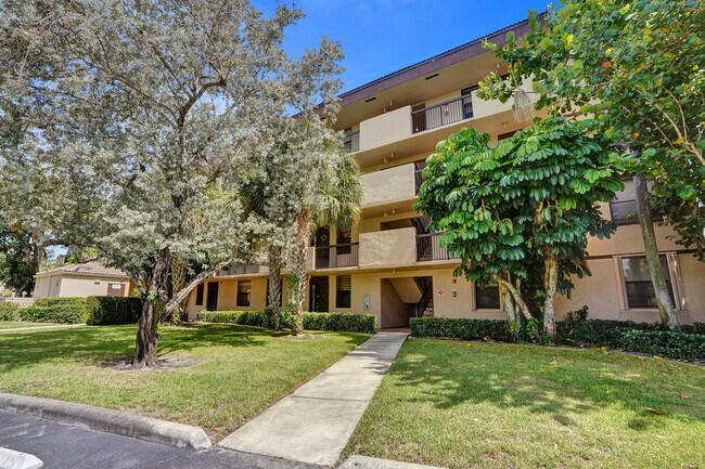 Building Photo - 2659 Carambola Cir N Unit A105 Rental