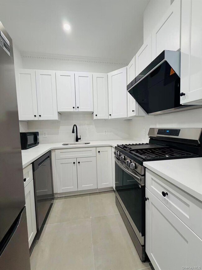 Photo - 60-24 Wetherole St Unit 3rd Fl.