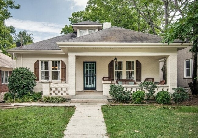 Building Photo - Welcome home to this stunning FULLY FURNISHED and AMPLE FREE PARKING for at least six cars!