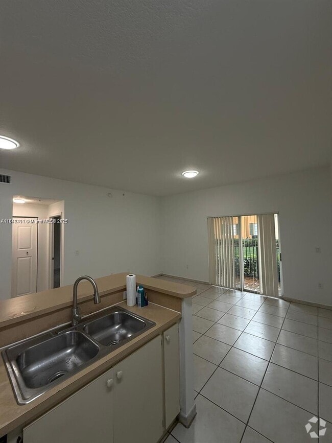 Building Photo - 7280 NW 114th Ave Unit 208-8 Rental