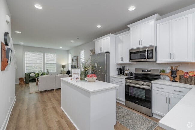 The Wilora - 3BR, 3.5BA - 1,786SF - Kitchen & Living Room
