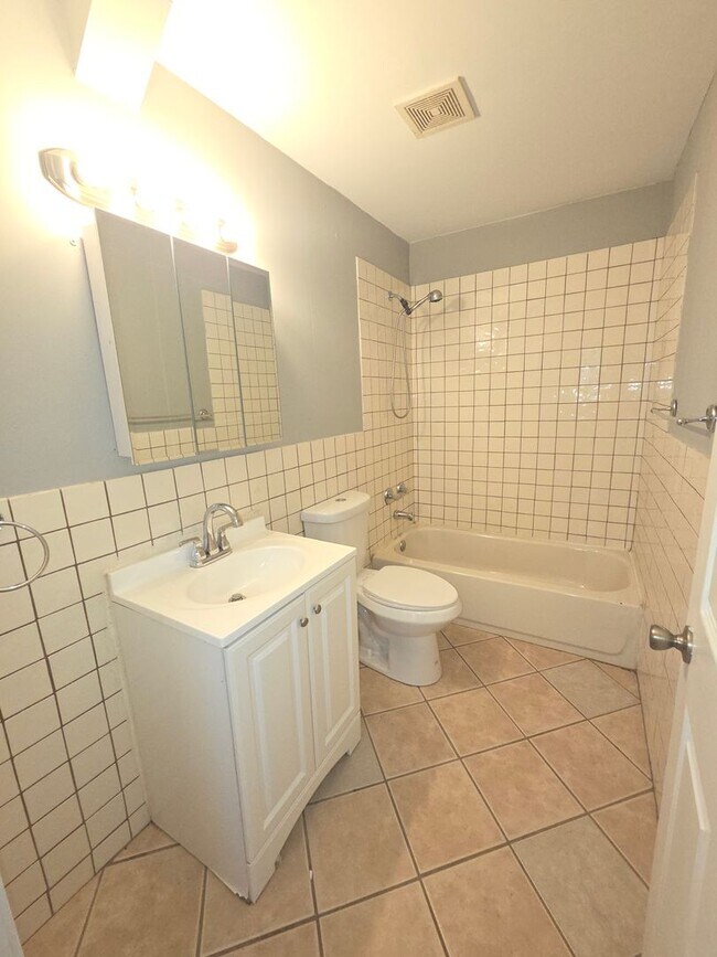 Photo - Single Family House with finished basement, garage, and backyard!