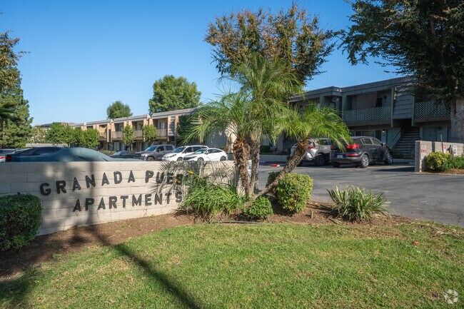 Entrance to Granada Pueblo Apartments