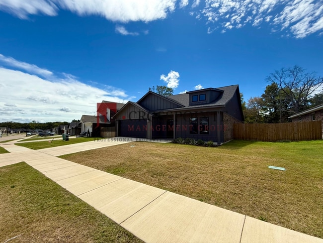 Photo - Spacious 4-Bedroom Home with 2.5 Bathrooms, 2-Car Garage & Fenced Yard